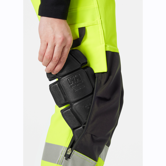 Helly Hansen 77428 Alna 4-Way Stretch Construction Pant Trouser Class 2 - Premium HI-VIS TROUSERS from Helly Hansen - Just £95.24! Shop now at Workwear Nation Ltd