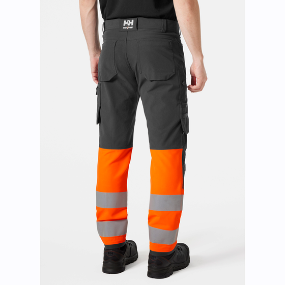 Helly Hansen 77429 Alna 4-Way Stretch Hi-Vis Cargo Pant Trouser - Premium HI-VIS TROUSERS from Helly Hansen - Just £90.48! Shop now at Workwear Nation Ltd