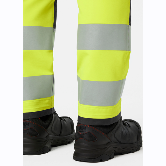Helly Hansen 77433 Alna 4-Way Stretch Hi-Vis Cargo Pant Trouser - Premium HI-VIS TROUSERS from Helly Hansen - Just £80.95! Shop now at Workwear Nation Ltd
