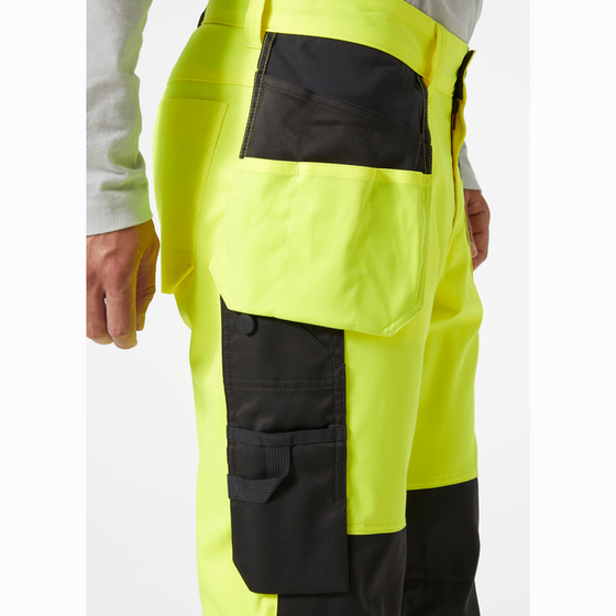 Helly Hansen 77512 UC-ME Hi-Vis Construction Pant Trouser Class 2 - Premium HI-VIS TROUSERS from Helly Hansen - Just £71.43! Shop now at Workwear Nation Ltd