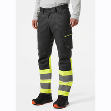  Helly Hansen UC-ME 2-Way Stretch Hi-Vis Work Cargo Pant Trouser Class 1 HI VIS YELLOW/EBONY / C54 - 38" Waist - 33" Leg