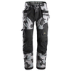 Snickers 6902 FlexiWork, pantalon de travail avec poche holster pour genouillères, camouflage gris Achetez uniquement maintenant chez Workwear Nation !